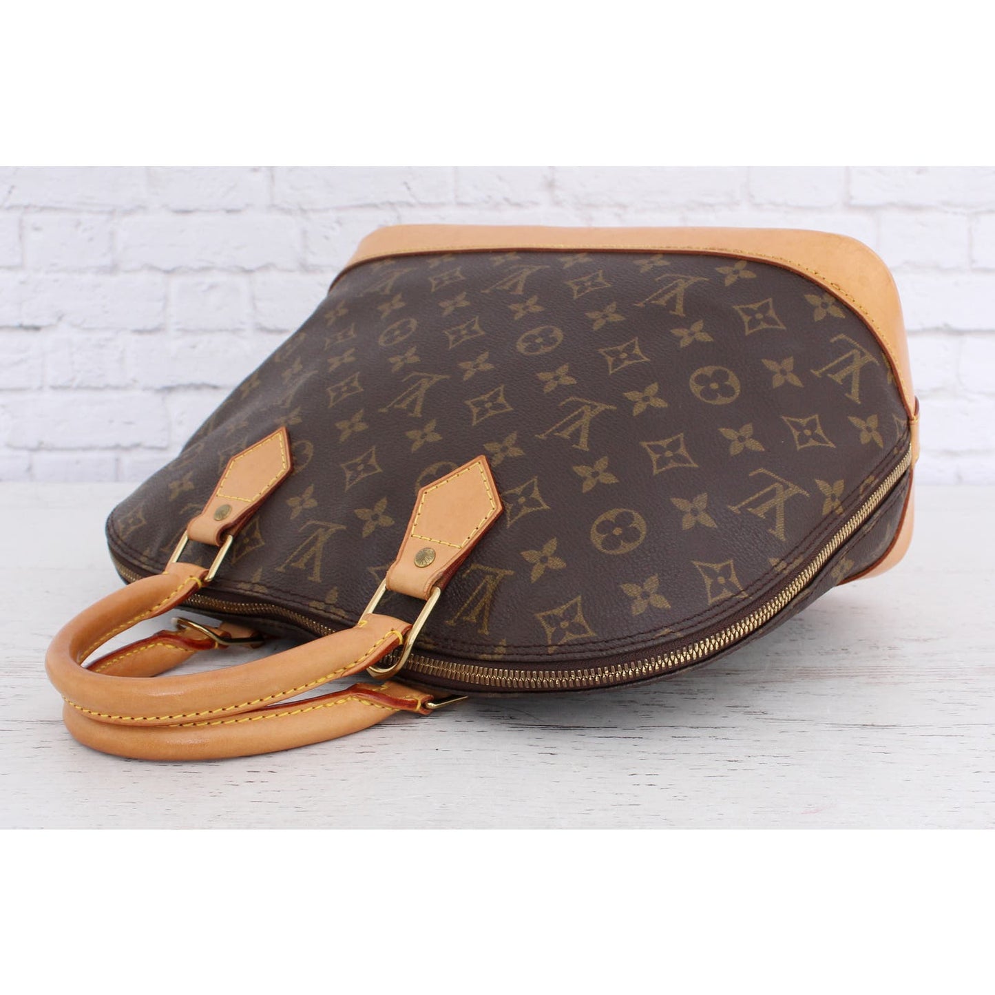 Louis Vuitton Alma MM Monogram Satchel