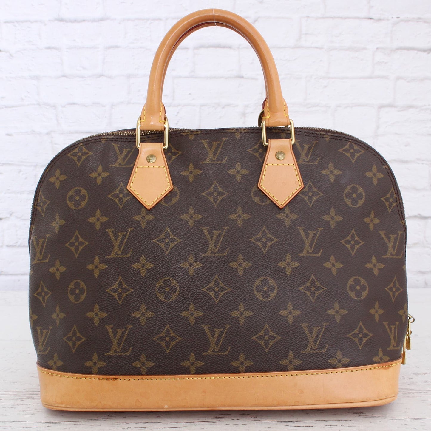 Louis Vuitton Alma MM Monogram Satchel