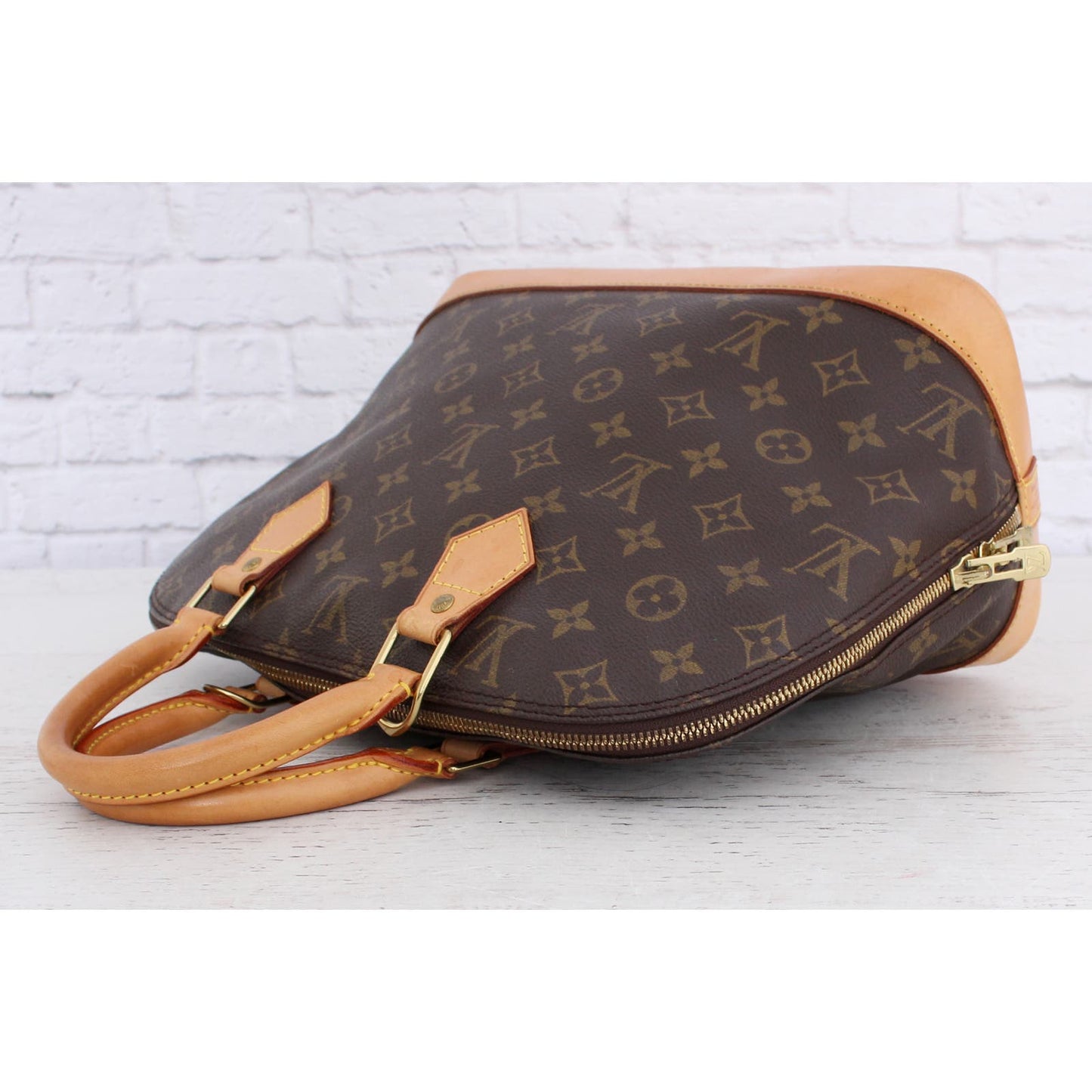 Louis Vuitton Alma MM Monogram Satchel