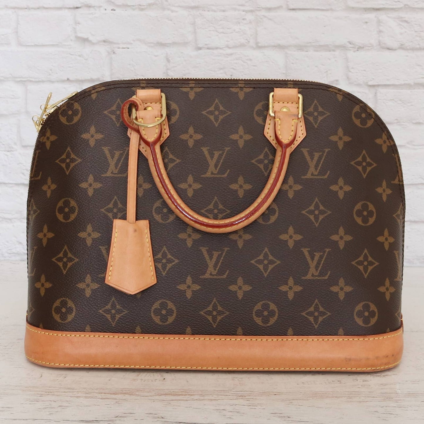 Louis Vuitton Alma PM Monogram New Style Satchel Leather Purse