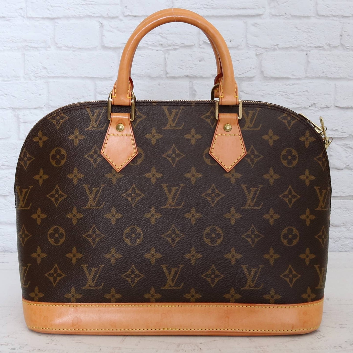 Louis Vuitton Alma MM Monogram Satchel