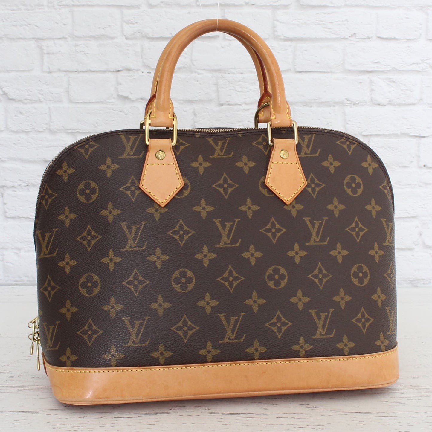 Louis Vuitton Alma MM Monogram Satchel